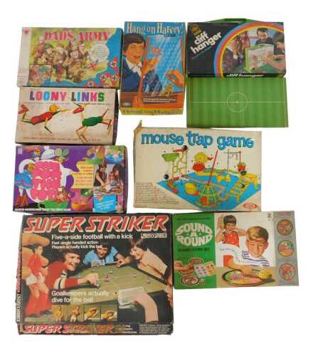 Games and toys, including Super Striker, One for the Pot, Dad's Army, and Cliff Hanger, all...