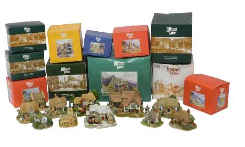 A group of Lilliput Lane cottages, boxed, including Roll Out the Barrel, Cradle Cottage, Old...