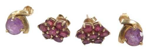 Two pairs of 9ct gold earrings, comprising a pair of garnet floral cluster studs, on single pins...