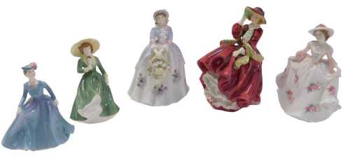 A Royal Doulton porcelain figurine Top O' the Hill, HN1834, a Royal Worcester limited edition...