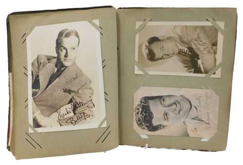 An album of photographs of film stars, to include Bob Hope, Errol Finn, Barbara White, Stewart...