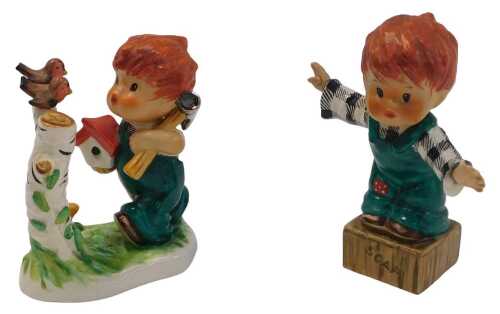 A Goebel figure of a young child, with birdbox, hammer and birds, indistinctly titled and signed,...
