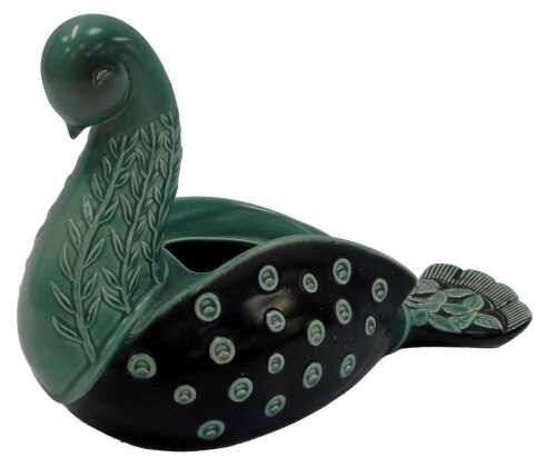 An unusual Beswick turquoise and black glazed ceramic dove shaped vase, impressed number 1556,...