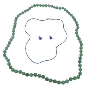 A jade single strand necklace, with carved spherical beads, on a knotted string strand, 66cm...