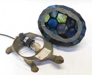 A Tiffany style tortoise table lamp, the shell in shades of blue and green glass, on a cast... - 2