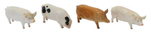 Two Beswick pigs, comprising CH Wall Queen and CH Wall Champion Boy, together with two Royal...
