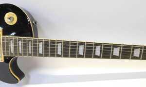 A Rockburn electric guitar, in black, with a mother of pearl inlaid finger board, 103cm high. - 3