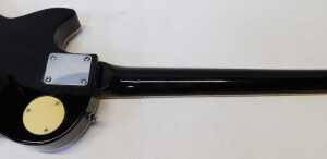 A Rockburn electric guitar, in black, with a mother of pearl inlaid finger board, 103cm high. - 7