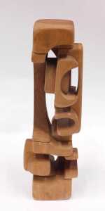 Brian Willsher (1939-2010). Interlocking design wooden sculpture, signed and dated 1982, 39cm high.