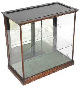 A late Victorian Fry's Choice Chocolate mahogany and glazed shop display cabinet, the outswept...
