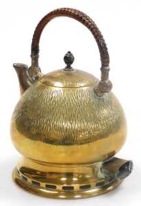 An early 20thC brass electric kettle, designed by Peter Behrens, with a hammered bulbous body,... - 2