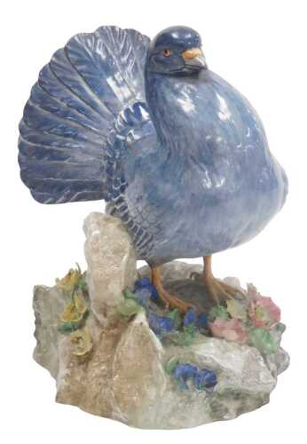 A Royal Crown Derby porcelain figure of a fan-tailed pigeon, printed and painted marks.