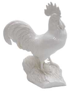 A Royal Crown Derby blanc-de-chine porcelain figure of a cockerel, modelled perched on a log,...
