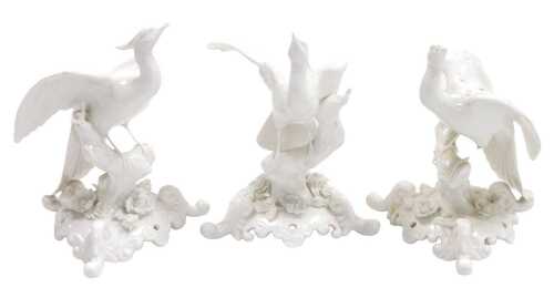 Three Royal Crown Derby blanc-de-chine porcelain Chelsea birds type figures, each modelled as a...