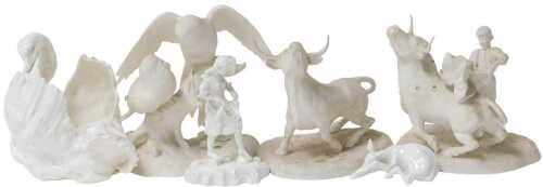 Two 20thC bisque porcelain figures, of a matador and a bull, a further bird bisque figure, a...