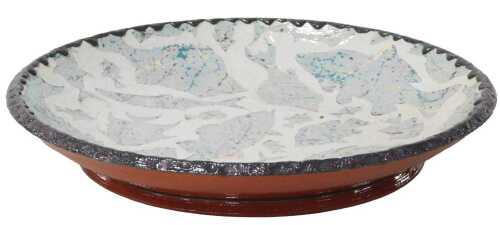 A late 20thC Gormaye studio pottery terracotta dish, slip decorated with fish, dated 1993,...