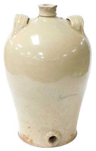 A late 19thC green glazed stoneware five gallon vessel, with twin loop handles, and tap aperture,...