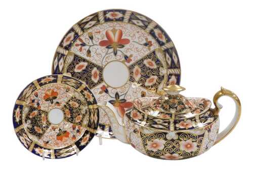 A Royal Crown Derby porcelain Imari pattern teapot, pattern no. 2451, together with a circular...