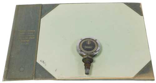 An early 20thC motoring related desk blotter, cloth bound, for Frank Chick, Motor & Cycle...