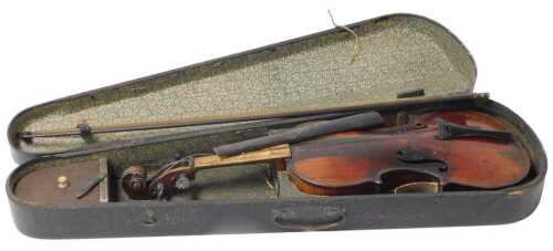 A 19thC Italian violin, with a single piece back, bears an internal label for Audreas Guarnerius,...