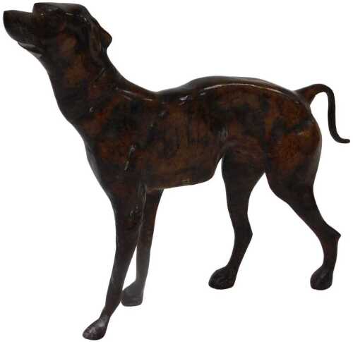 A late 20thC cast metal figure of a greyhound, modelled in a standing pose, with a mottled brown...