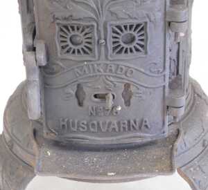 An early 20thC Husqvarna cast iron Marco stove, model no. 78, embossed with flowers, raised on... - 2