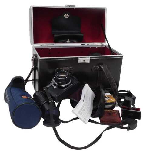 A Pentax MES camera, with a 1:1, 7, 50mm lens, together with a Pentax-A Zoom lens 1:4, 70-200mm,...