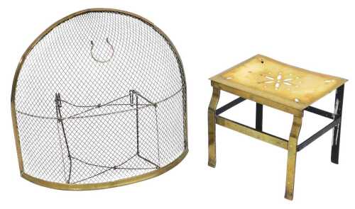 A Victorian brass and cast iron kettle stand, of rectangular section, with a pierced floral...