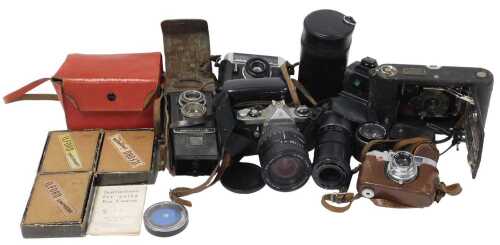 A Voigtlander Vitoret Rapid D camera, a Voigtlander Brillant camera, Pentax ME camera, further...