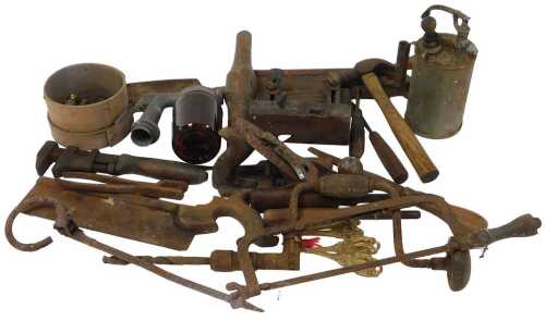 Vintage carpentry and other tools, including saws, routers, files, and a plough plane, a...