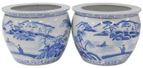 A pair of 20thC Chinese blue and white porcelain jardinieres, decorated with river landscapes,...