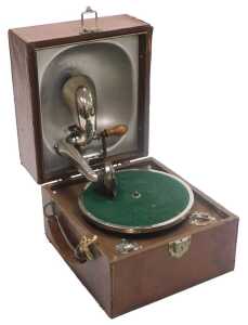 An early 20thC Decca brown leather cased gramophone, 21cm high, 24cm wide, 27.5cm deep.