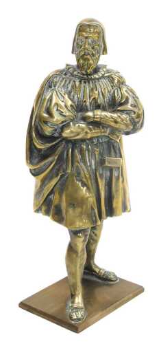 A late 19thC polished bronze figure of a Renaissance gentleman, modelled standing, on a...
