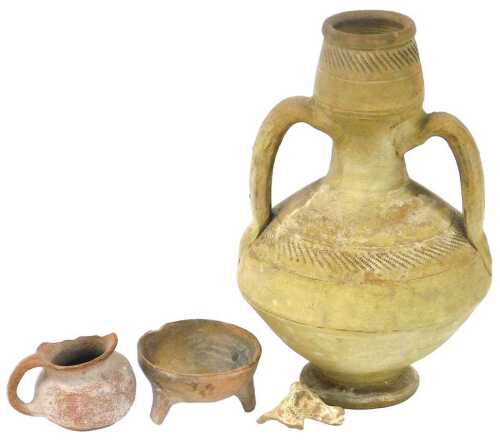 An African pottery twin handled vessel, 25.5cm high, a terracotta jug, possibly Bronze Age, and...