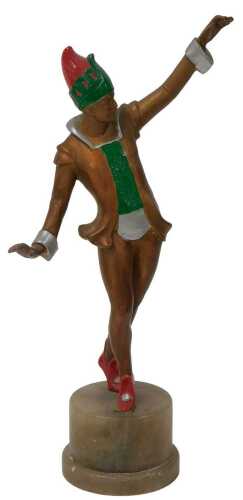 An Art Deco cold painted metal figure of a Pierrot, in the manner of Lorenzl, raised on a white...
