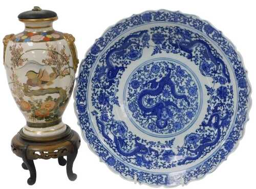 A late 20thC Chinese blue and white porcelain dish, decorated with dragons and flowers, six...