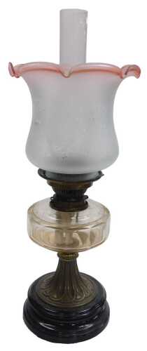 A late 19thC Hink's duplex brass oil lamp, with a black socle, clear faceted glass reservoir,...