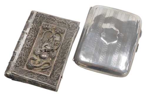 A George V silver cigarette case, with engine turned decoration, raised shield reserve,...
