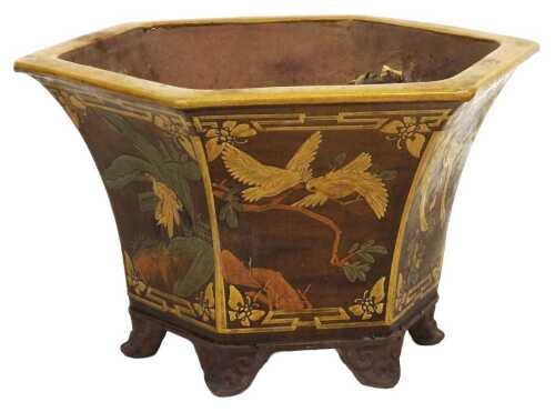 A 20thC Chinese pottery jardiniere, of hexagonal form, decorated with panels of birds and...
