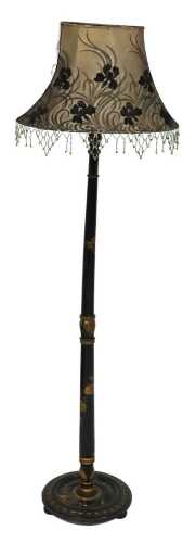 An early 20thC Japanned black lacquer standard lamp, painted and gilt decorated with figures,...