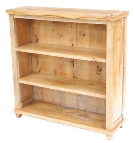 A Victorian stripped mahogany open bookcase, of two shelves, raised on block feet, 120cm x 120cm...