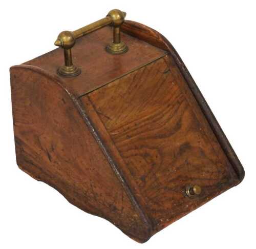 A Victorian light oak coal box, with a brass carrying handle, the hinged front opening to reveal...