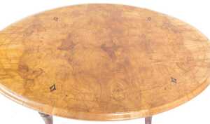 A Victorian walnut and inlaid occasional table, with an oval top, raised on turned supports and... - 2