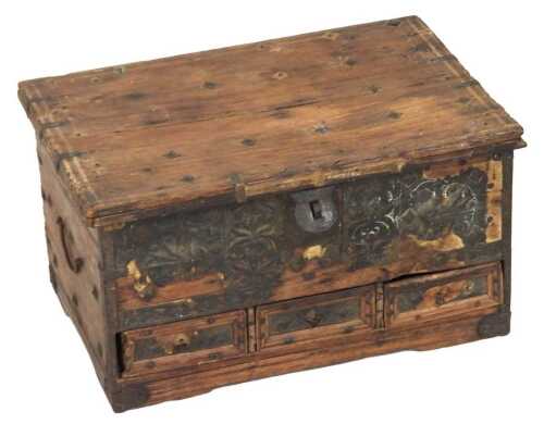 An early 20thC Indian teak and metal bound dowry chest, with metal strapwork, the hinged lid...