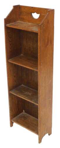 An early 20thC oak narrow bookcase, of four shelves, 92cm high, 30cm wide.