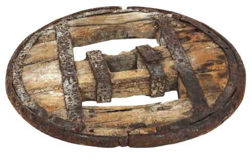 A 18th/19thC iron bound wooden wagon wheel, 82cm wide.