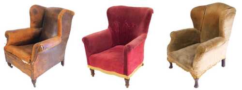 A Victorian wing back armchair, upholstered in brown leather with studded borders, on turned...