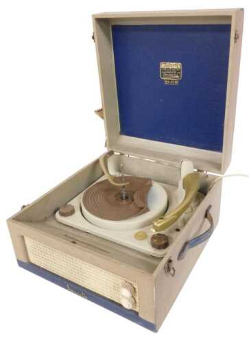 A Dansette vintage portable record player, in a gold and blue coloured case, 41cm wide.