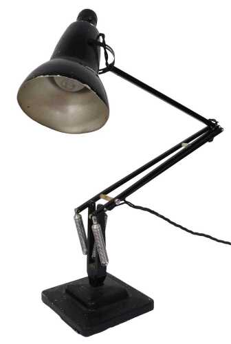 A black mid 20thC Anglepoise lamp, on a stepped base, 15cm wide. (AF)