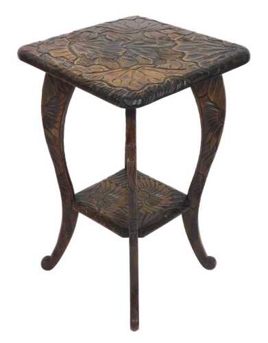 An early 20thC Arts and Crafts Japanese carved hardwood occasional table, for Liberty of London,...